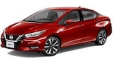 Nissan Versa eller liknande