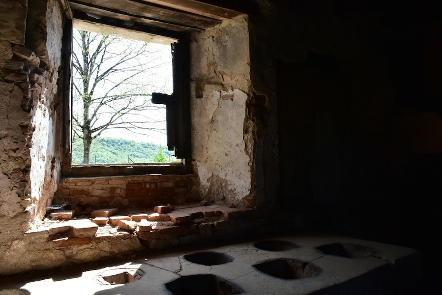 Just 25km west of the much-visited Cordes-sur-Ciel is this spectacular village, topped by two competing chateaux perched on the edge of a cliff overlooking the Aveyron River. One chateau is from the 12th century but the other was built next door in the 15th century by a feuding cousin. This is the kitchen of the 'new' chateau.