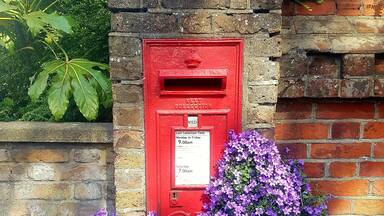 I love Red and I love the UK. The two compliment each other so well. Beautiful things like this postbox make simple tasks a joy. #sendingletters #postbox #UK #red #purple #flowers #garden 