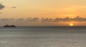 View from the Sky Lounge atop the Westin Cozumel, Mexico.  Sunsets here take on multiple vibrant hues of color as night approaches.