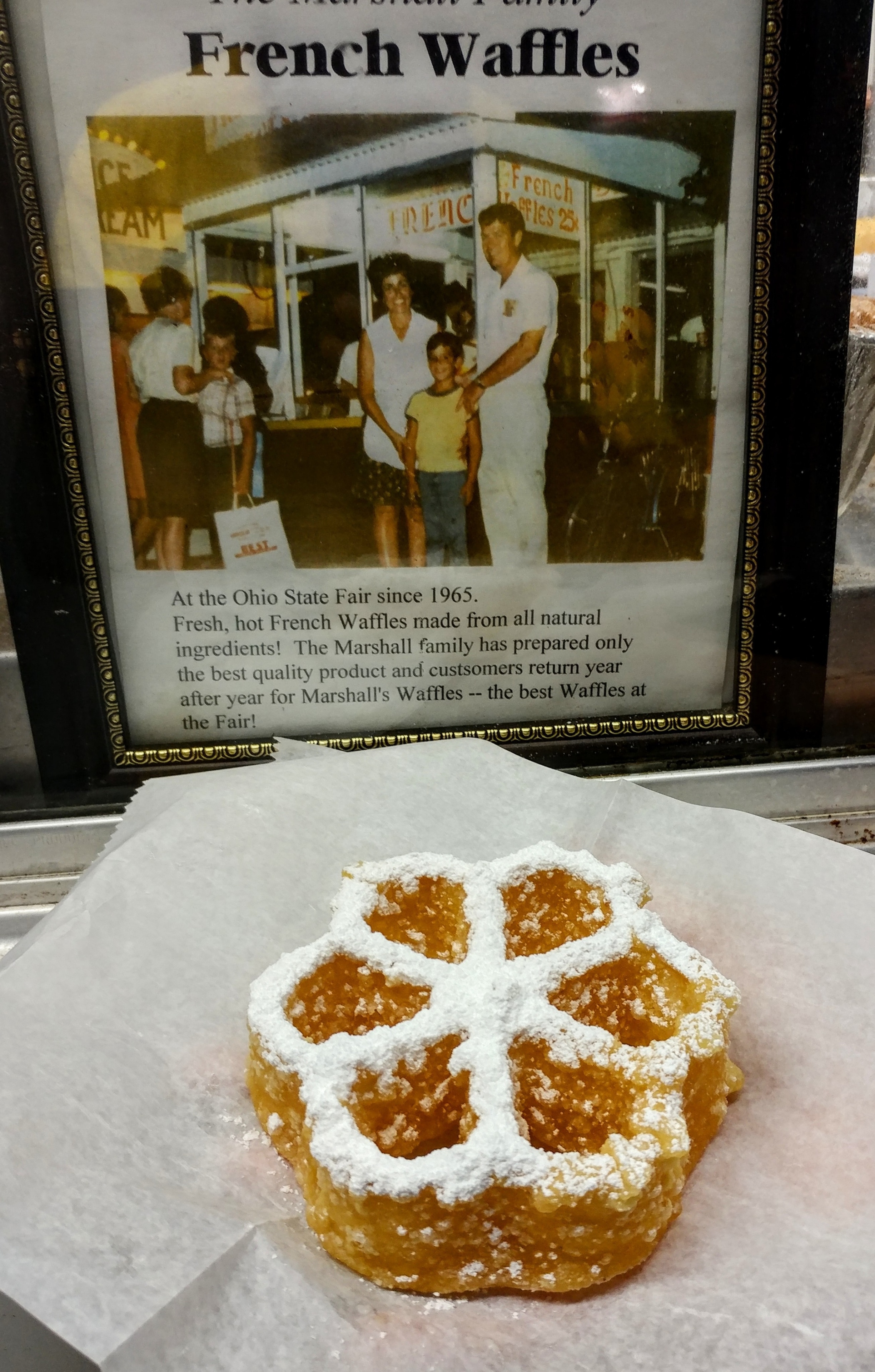 It's time again for the Ohio State Fair, which means it's time for a deep fried fair food feast!

A staple at the fair since 1965, Marshall Family French Waffles.

Basically a branding iron is dipped in batter and dropped in a deep fryer to create the crunchy, flaky, sweet treats.