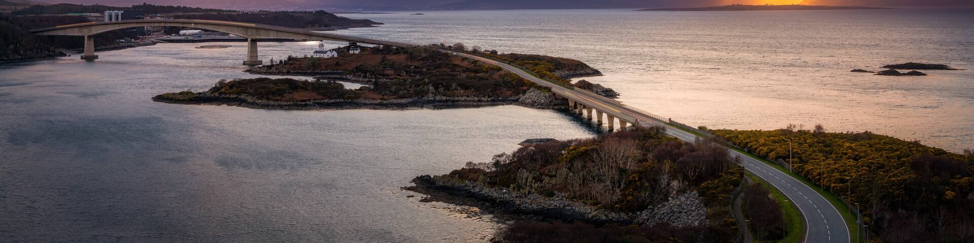 There is a spot called the Plock near the Skye bridge where you can capture photo like this. All you need to do is park your car and walk up to the view point.