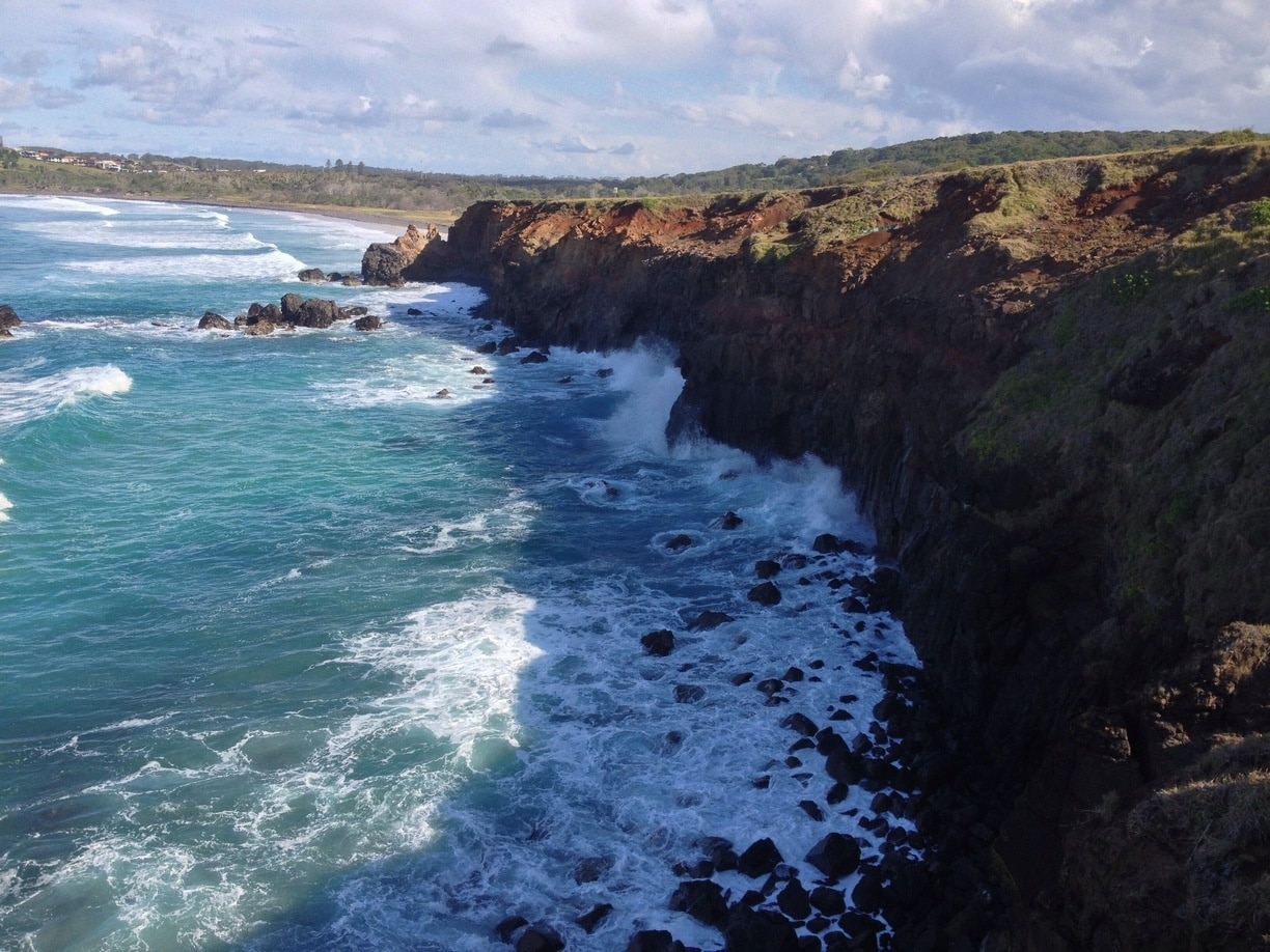 The cliffs of Pat Morton Lookout, Lennox Head, NSW. This is my favourite place in the Northern Rivers, as the sweeping meadow, high cliffs, pebbly beach and vast expanse of sea makes me feel I'm far away on an adventure.