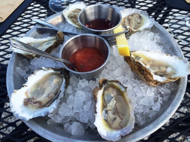 Delicious spot in Urbanna, VA for fresh, local oysters (fished right in front of the property!). The same people that own Rappahannock Oyster Bar in DC own this, I believe. 

They have a good wine and beer selection and other tasty dishes like pimento grilled cheese and fresh salads. Definitely worth a stop if you're in the area. 

More info here: http://www.badsentences.com/food-merroir/