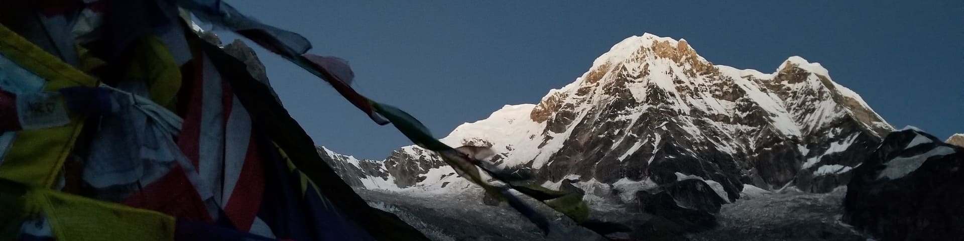 The highlight of my Annapurna Base Camp trek, nine days of exertion and awe, was this morning. Waking up at 4am to ascend the final hours between Machhapuchchhre and Annapurna base camps. So early in the season and after being separated from my hiking companions the day before I was alone. But not lonely. It was a quiet morning of reflection, catching my breath in the headlamp, before the sun broke from behind the mountains. And as the horizon transitioned from muted pinks and purples to brilliant blue, the energy of new day, the snow-capped peaks ahead felt like electricity. I danced up the mountain, my elation expressed in hurried step and shallow yawns. The Himalayas surrounded and I was filled with an immensity of oneness. Breathing in that wild air deep, feet on cool earth, my back to a rising sun.
#Adventure #AdventureContest #Nepal #AnnapurnaBaseCamp #ABCTrek #Hike #ExploreTheGlobe #Travel