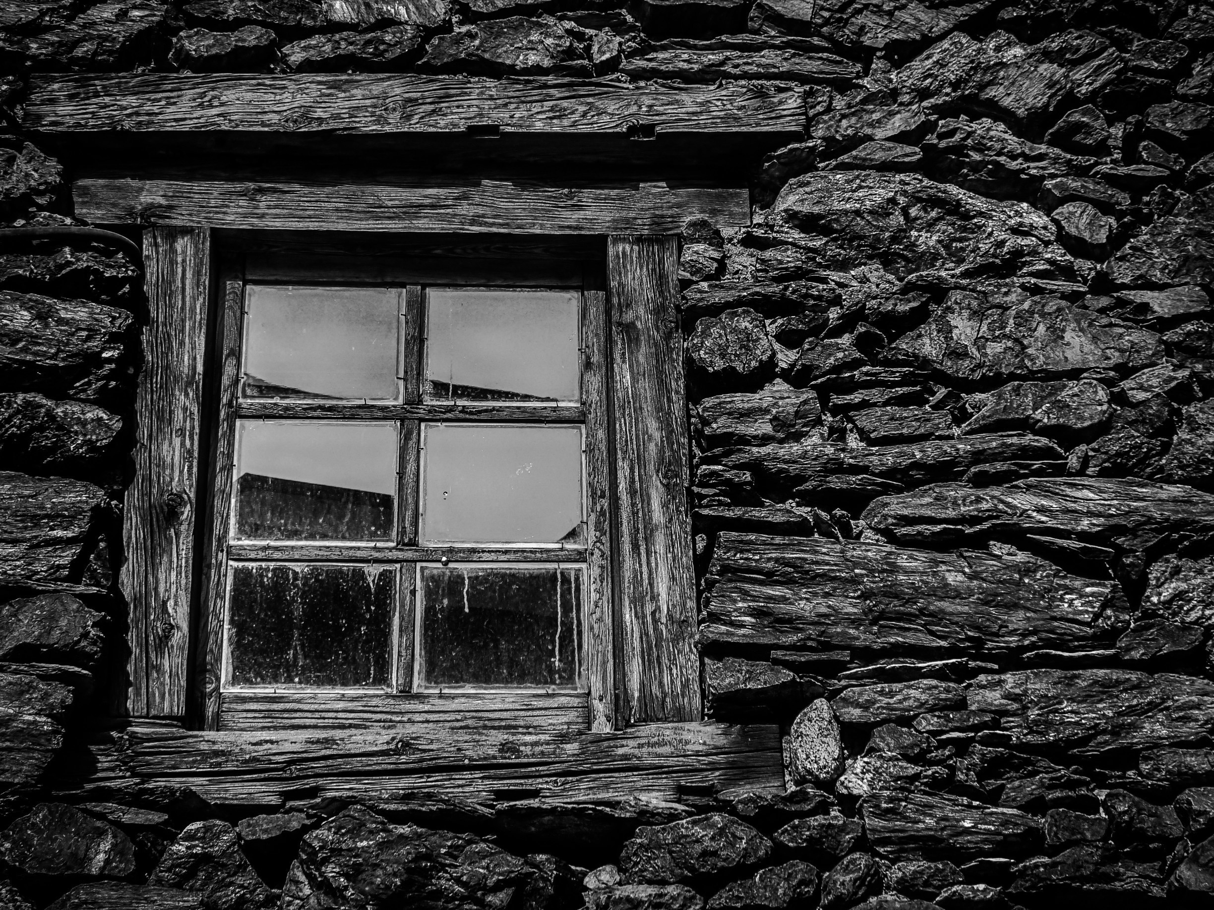 Window from the Sant Bartomeu Church in Soldeu, Andorra. 

This small Romanesque chapel, located on the village of Soldeu in Andorra, is dedicated to St. Bartolomé and dates from the seventeenth century. http://bit.ly/1Y4gTVu