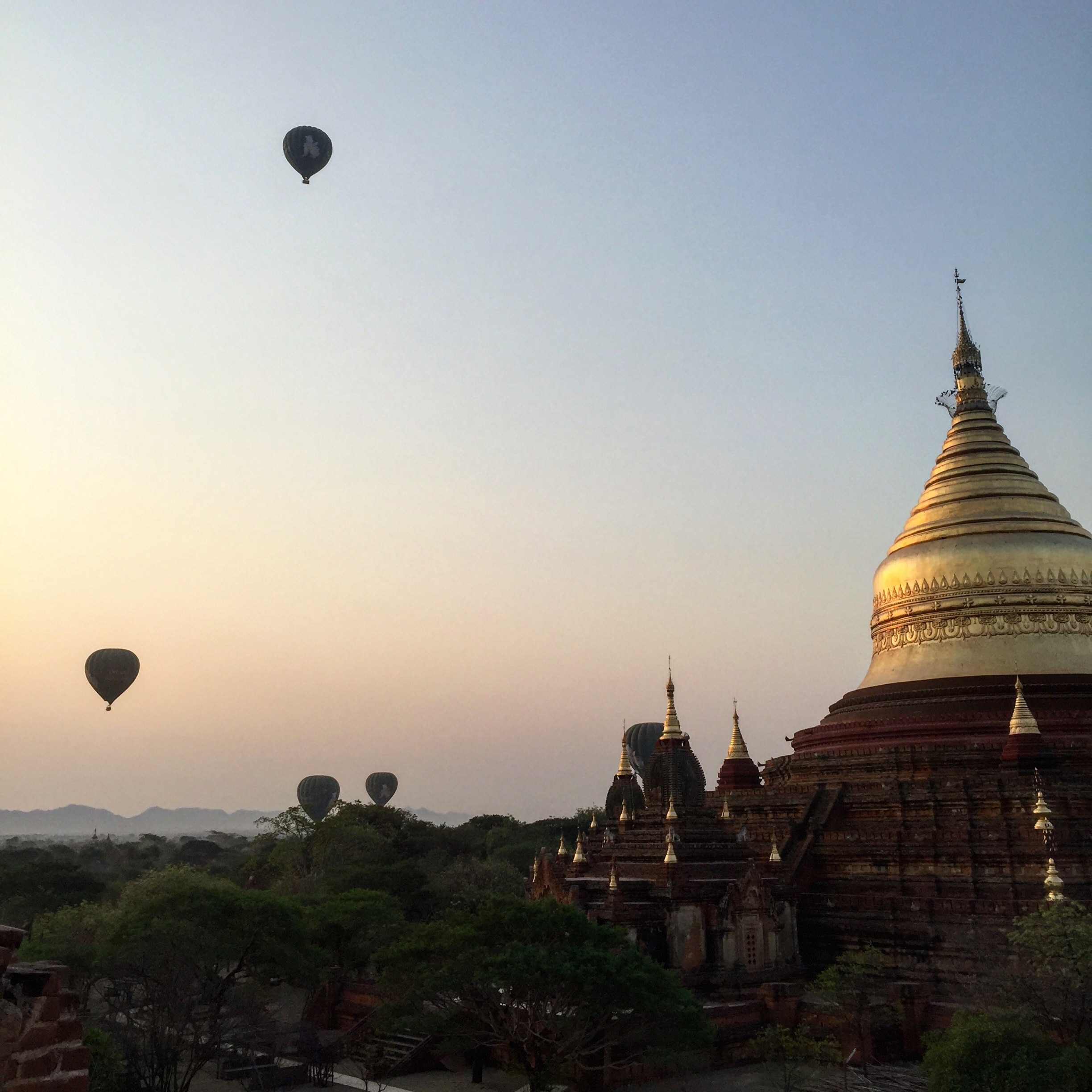 Sunrise hot air balloons create an awe inspiring view. We set off early in order to find a pagoda with a great view. #bagan #myanmar #trover