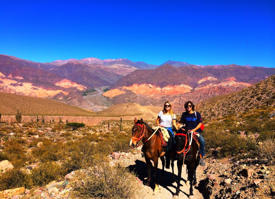 Rent a horse (& guide) to explore the area around Tilcara and admire the incredible multi-coloured mountains
