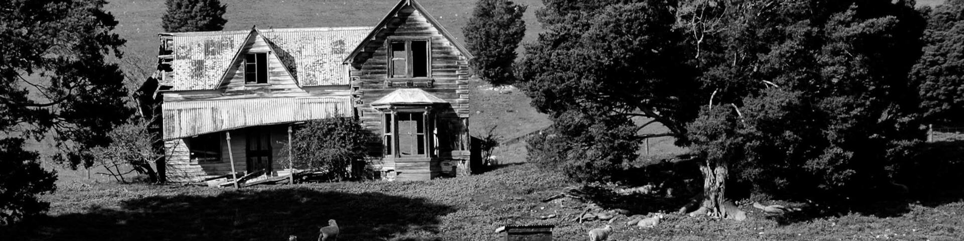 Near Nelson, South Island, New Zealand. Abandoned house. There are a lot of abandoned houses dotted aroudn the New Zealand countryside. Although you don't want to get in trouble for tresspassing, they can be fun to explore. 
More photos https://tinyurl.com/y8p6rzrk
 #abandoned #NewZealand #Nelson #Decay #Derelict #Nikon #D70 #Black & White #monochrome