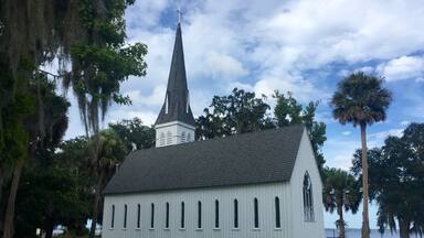 This church was organized in 1878. Beneath each window you will see a fire escape. Absolutely beautiful location on the St. John's River.