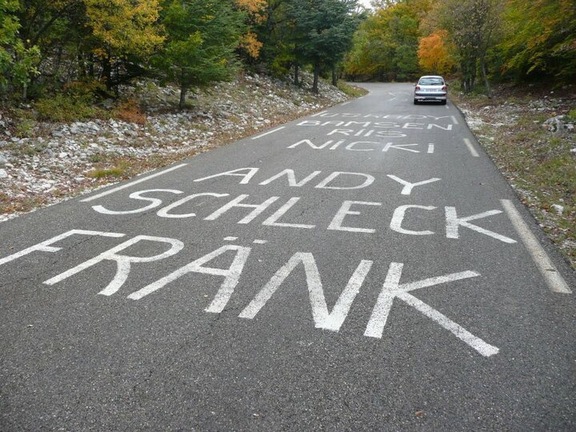 I went to Mont Ventoux a year after the Tour de France used it on their route, but you could still admire the graffiti on the road! The lower slopes are wooded, but half way up you arrive to a barren moonscape - according to the car temperature gauge it was 10 degrees at the foot of the hill and -4 by the time we got half way up.