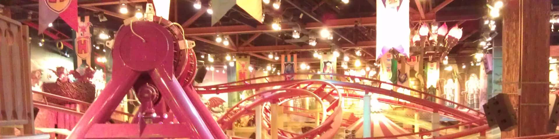 Amusement park inside a shopping centre in Moscow.  Contains a collection of children's rides and small thrill rides including the family roller coaster Babylon.