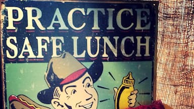 Practice safe lunch; use condiments!

BBQ joint next to a small airfield. Cool spot to hang out on the patio picnic benches when the weather is nice.