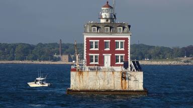 New London Ledge Lighthouse sits at the mouth of New London harbor. New London Ledge is locally famous for the ghost of an early keeper named Ernie who allegedly haunts the lighthouse.