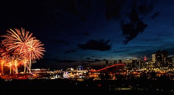 Calgary skyline with a sprinkle of stamped fireworks. 