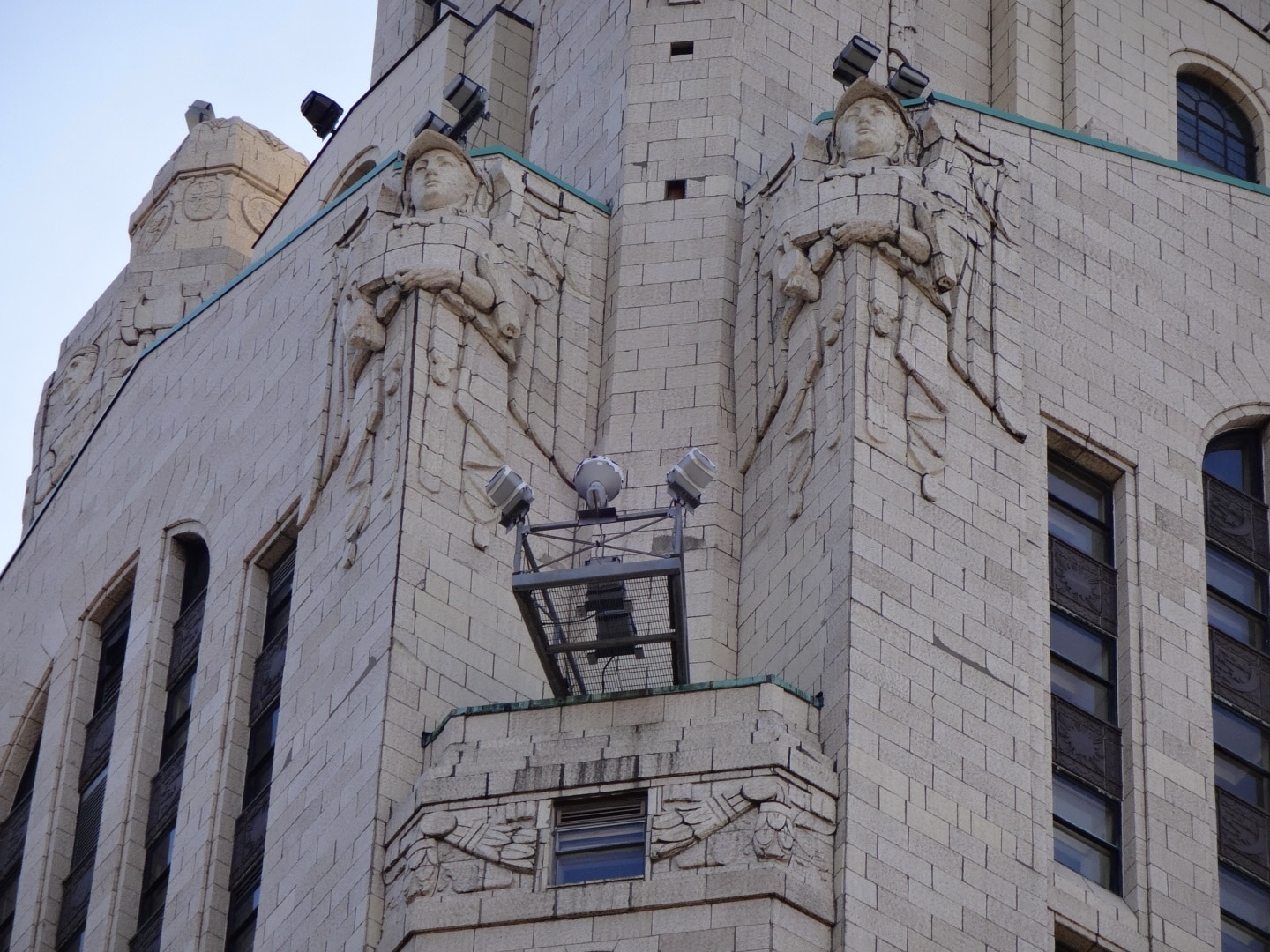 The LeVeque Tower is a steel frame building covered in glazed architectural terra-cotta tiles with an oak-bark texture.

Originally, the building's exterior featured a large number of sculptures. However, much of it had to be removed because the terra-cotta began to crumble and fall to the street. Lost sculptures include four 18 feet eagles at the corners of the building at the 36th floor and four 20 feet statues of colossus and youth on the sides of the building at the setback of the 40th floor 

The spaces left by the departed sculpture serve as the bases for lights used to illuminate the tower. The Tower is often illuminated in white, but the colors change for certain holidays. Green for St,. Patrick's Day. Red, White and Blue for the 4th of July. Red and Green for the Christmas season.

#architecture
