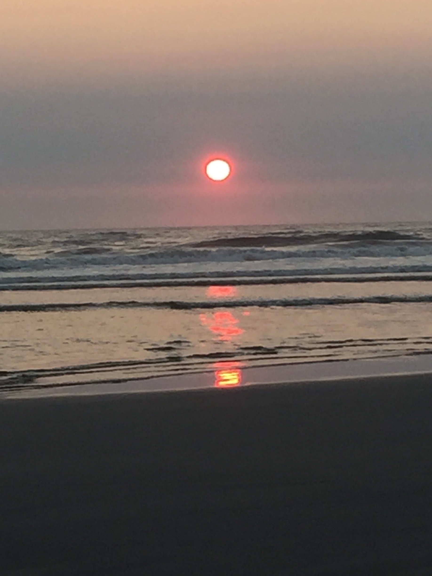 Loved seeing this sunset through the smoke haze coming from British Columbia and Washington. So much beach when the tide is out. 