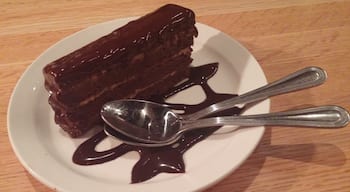 Alternating layers of chewy brownie and rich peanut butter, covered with dark chocolate ganache!

I usually stuff myself on savory pizza pies and have no room for dessert pies. On this trip, I boxed up some pizza for a cold pizza breakfast the next morning so I could further indulge in this delight!