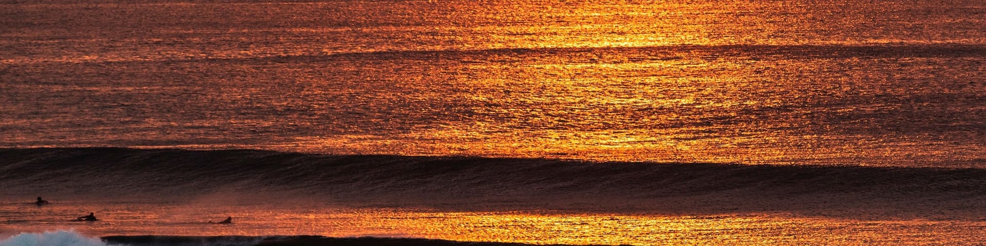 Sunset over Impossibles Beach as seen from Anantara Resort.