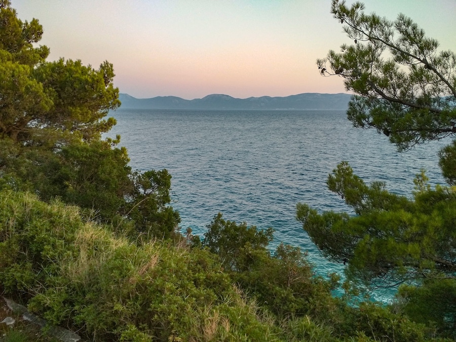 Quiet part of beachside, beaches squeezed between forests and sea