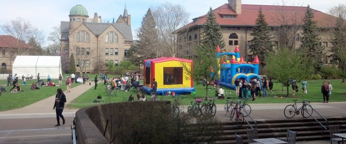 Wilder Bowl, the heart of Oberlin College, is a large, open grassy area where the students hangout on a nice day.  It also hosts "stress-relieving" bouncy tents and obstacle courses during mid-terms.