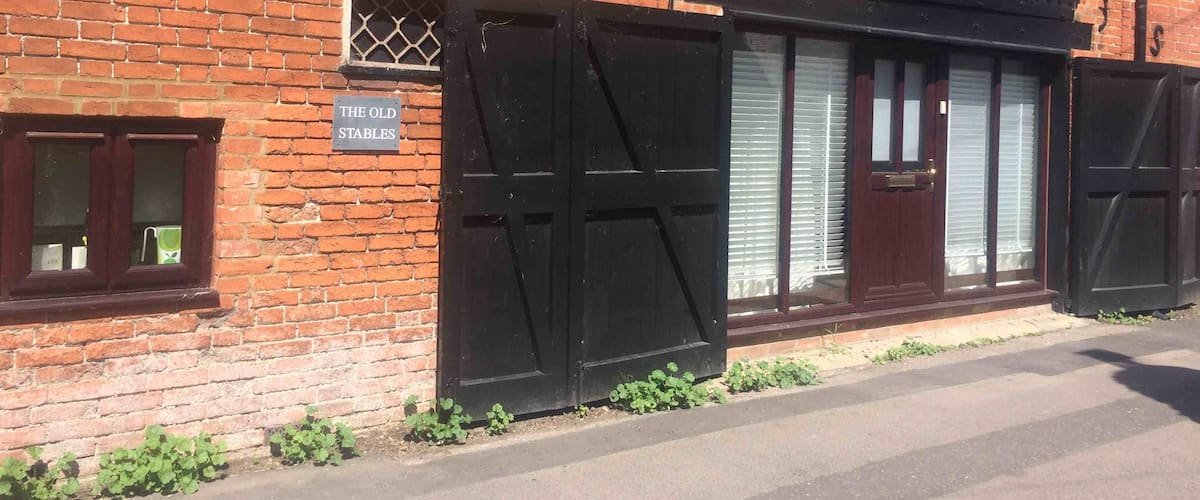 This is very innovative old stable entrance now converted to a house door.