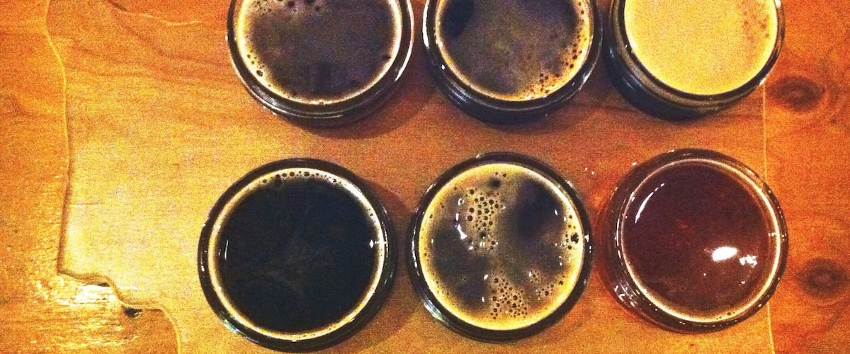 A flight of beers from Kulshan Brewing served on a cute Washington state shaped platter.
Located in Bellingham, Kulshan is a great spot to grab a beer, chill on their awesome patio and listen to live music.
They have rotating food trucks outside or you can bring food from elsewhere and eat there. Bonus: Trader Joes is a block away so you can load up on snacks, grab a table and some beers at Kulshan and hang out!
#beer #bellingham #america