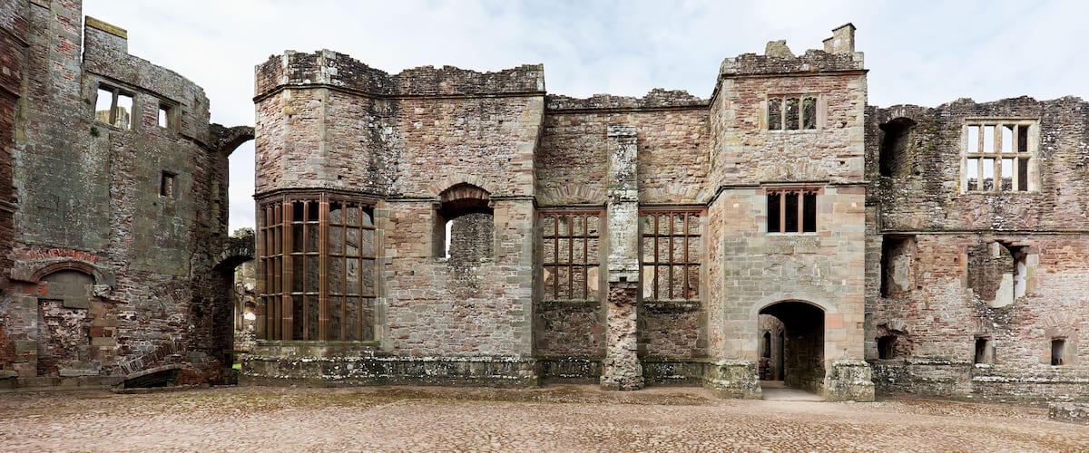 The castle courtyard highlights some of the fine details that went into the castle construction.
Raglan is a grand 15th-century castle that eventually fell to Parliamentary forces during the English Civil War (1646). The castle was surrendered mostly in-tact, but was slighted (purposefully disabled) to prevent any future use as a fortification.
Today it's an atmospheric ruin that makes for a fun visit.