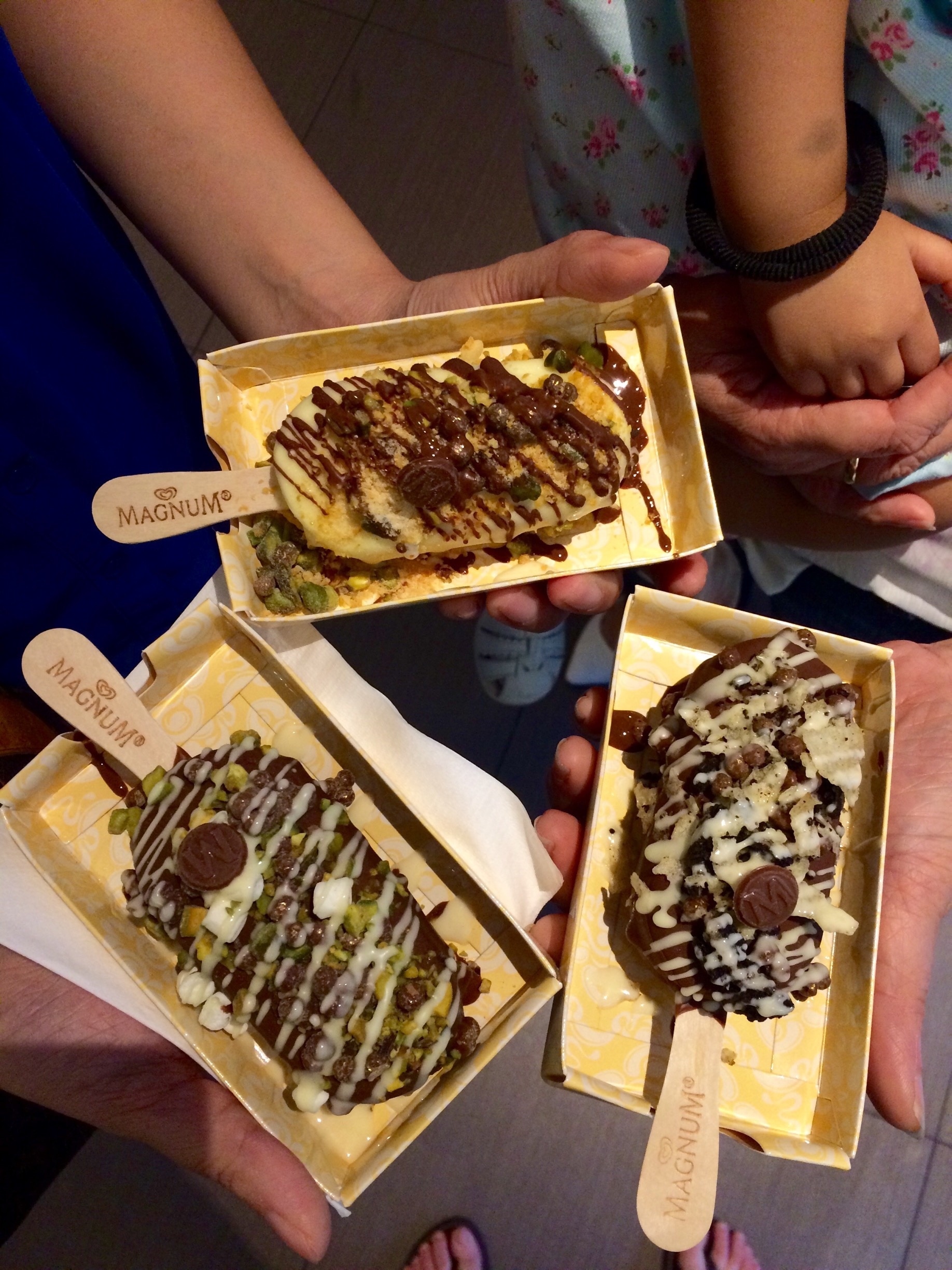 MAGNUM ICE CREAM SHOPPE - Make your own magnum bar! Everything from potato chips, honeycomb, pistachios, cookie crumbles, and even cheese?!