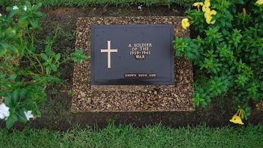 An unknown soldier's grave.
This place is known by locals as the war cemetery or the Allied cemetery. It is an incredibly well maintained cemetery honoring the soldiers who lost their lives in WWI and WWII. We were overwhelmed by the number of graves and the 27,000 other soldiers who were honored but unable to be buried. If you are in Yangon you should definitely make the trip to the cemetery.
To get here we took the circle train out of Yangon Central Railway station to the stop Kyaikkale (one after the Golf Course stop). From that station we walked to the road and hailed a taxi. It took 4 or 5 to find someone who could speak enough English to take us there. We paid 8000 Kyat (appr. 8 USD) for the ride there, for him to wait, and for the ride back to the station. It takes about 15-20 minutes in the taxi to get there. The locals use the cemetery more like a park and were more interested in us than anything else. This was irritating but as tourism is so little still it is understandable. Entrance is free.