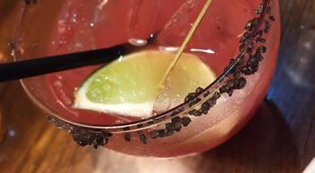 Watermelon margarita, made complete with Hawaiian black lava salt on the rim...piquantly, refreshingly delicious.