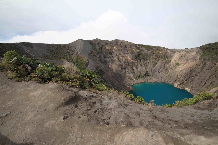 Irazu Volcano is a short trip from San Jose, Costa Rica. The drive up to the volcano's crater lookout takes you through some beautiful scenery around the Cartago area. Worth the drive on its own. As we ascended the volcano, the cloud cover moved in and totally blocked everything from view. They only moved out long enough to make our way to the view points and snap a couple pictures. Then it clouded back in. The volcano's summit is at 3432 meters (11,260 ft) and they say that on a clear day you can see the Atlantic Ocean and Pacific Ocean.