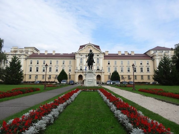 This is the main entrance to the St Stephen University of my hometown in Godollo, Hungary. The city is small and cozy and has a couple of nice attractions and landmarks such as a castle, the university, city museum and a market. Godollo is surrounded by forests and hills. They are perfect for an adventure on your bike or by car. Budapest, the capital city is only a short 30-40 minutes drive away. I love coming home here.
#Godollo #Hungary #GodolloCity
