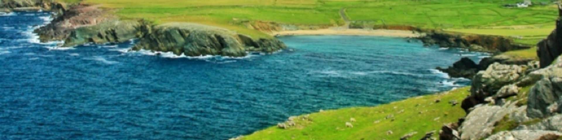 The western coast of Ireland offers some of the clearest and most beautiful water one can ask for. It also boasts amazing landscapes, beautiful green fields, a polite and happy culture, and a one of a kind experience that is like no where else I've ever been to. It's a place everyone should see if your a traveler of land, culture, or both.