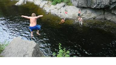 Swimming at the ledges of Lower Coos Canyon on the Swift River of Western Maine.