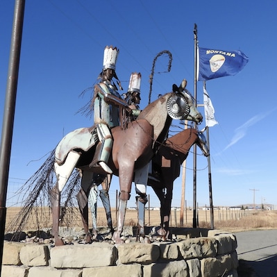 Nin-na-stako: Chief Mountain is constructed of recycled materials and remnants from the flood of June 8, 1964. Old rusted barbed wire was used for the tail and mane of the horses. The base is made from sandstone harvested from the Two Medicine Catholic Mission which was built in the late 1800's. This is located near the Montana and Canada Border on Hwy. 89. The Canadian border is 1.25 km north from this sculpture.
#OnTheRoad