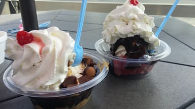 A pair of sundaes from Dairy Shed in Chillicothe, OH.

A red velvet roll a la mode sundae with vanilla ice cream, hot fudge, whipped cream and a cherry on top of red velvet cake.

A buckeye blitz sundae with hot fudge, peanut butter sauce (the single best ice cream condiment!) whipped cream and a cherry!

#delicious