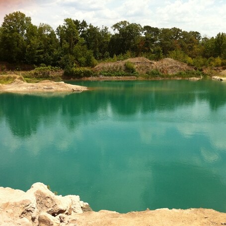 value: "The Cliffs in Lindale, Tx. Old limestone quarry that was flooded when miners hit a spring. "
