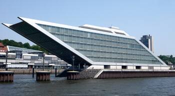 The Dockland office building is located on the north bank of the river Elbe opposite the Hamburg container terminal. The site itself is a protruding spit of land used as a dock until 2004 for the ferry terminal.