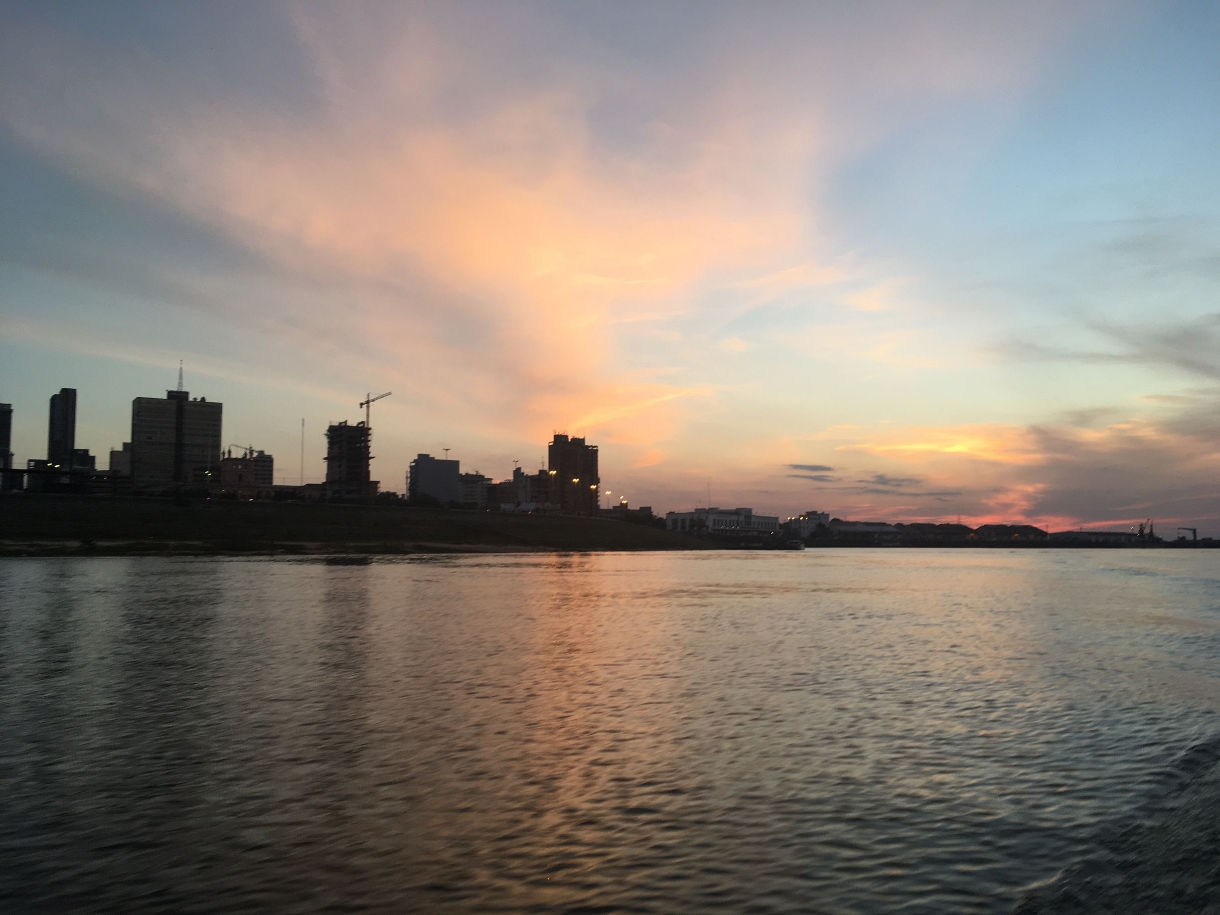 Asunción at sunset from boat 