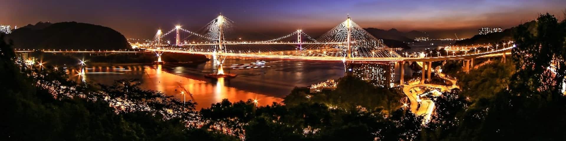 Night view of Ting Kau Bridge over the sea