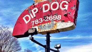 From the website:
http://www.dipdogs.net

The Dipdog originated in 1957 by Lester Brown, In 1963 interstate 1-81 came thru and a lot of the businesses on Hwy 11 left or got left behind. I think the reason the Dip Dog thrived  was that the DipDogs were unique and something different that people could enjoy at a low cost.. Then it was purchased in 1966 by Grant S. Hall Sr. and he owned the DipDog til 1979. The family ran the business. Grant and his wife Olivene and children all worked there.  It was a lot of hard work but we also have a lot of good memories that will last a lifetime.  Then Grant Jr and Pam  purchased the dipdog in 1979 and our children Crystal and Justin also have worked at the Dipdog with us and now we have other family members growing up in the business as well. There have been 50th wedding anniversaries celebrated at the Dipdog along with engagements, and Teenagers going to the prom .  We also have had Aerosmith come by and eat with us. We have been listed in the Southern Living Magazine.  We have also been in books with the best service.  And since 2004-2006 we have been voted 
Best Overall Restaurant
Best Service
Best Hamburger
Best Hotdogs
Best Fries
Best Chili
Best Ice Cream
 For all the things we have been voted for and for all the years and the memories  we want to say THANK YOU TO OUR CUSTOMERS.
 