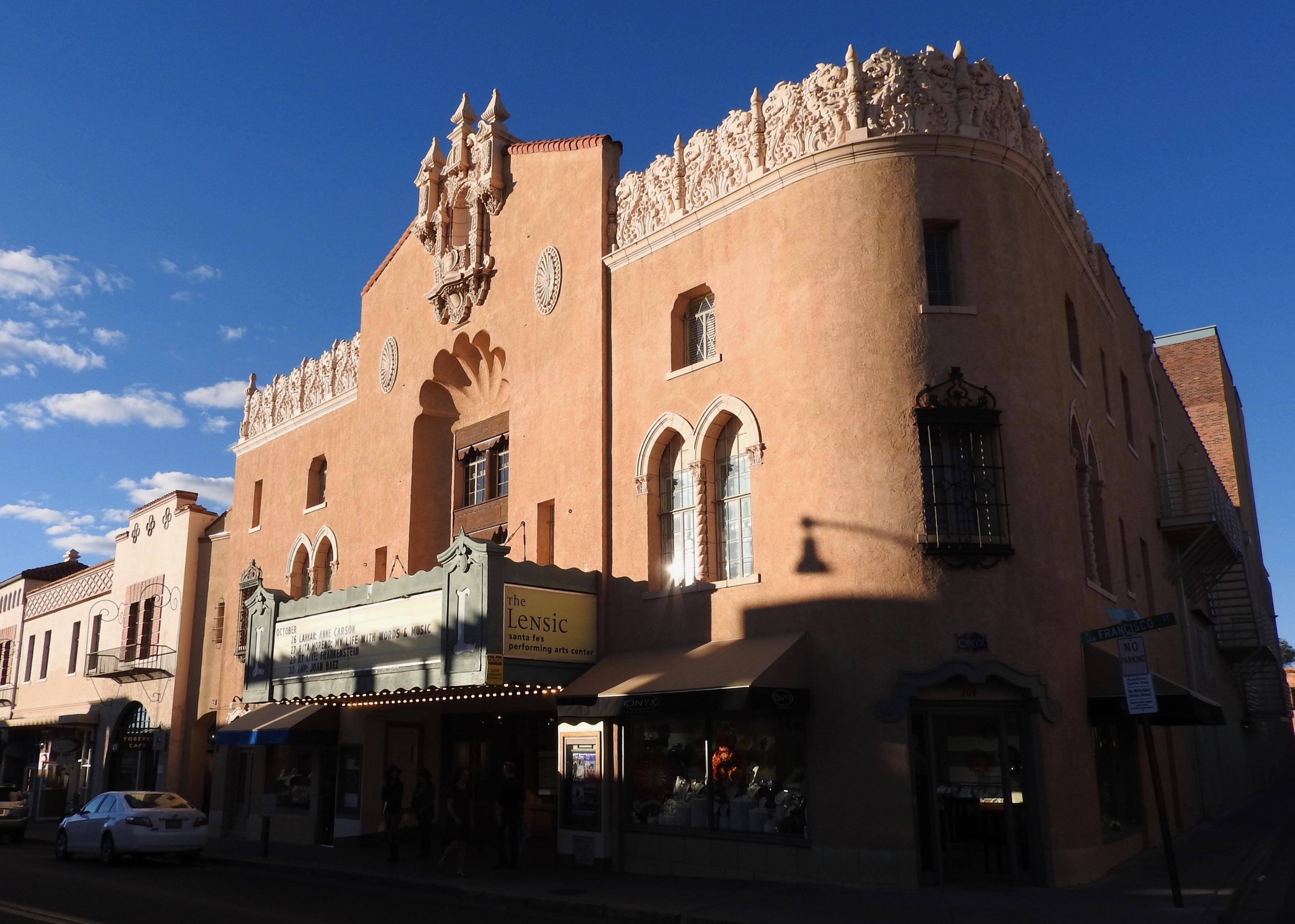 The Lensic Theater, located at 211 West San Francisco Street in Santa Fe, New Mexico, is an 821-seat theater designed by Boller Brothers of Kansas City, well-known movie-theater and vaudeville-house architects who designed almost one hundred theaters throughout the West and mid-West, including the KiMo Theater in Albuquerque. The pseudo-Moorish, Spanish Renaissance Lensic was built by Nathan Salmon and E. John Greer and opened on 24 June 1931. Its name derives from the initials of Greer's six grandchildren. The Lensic was completely restored and renovated between 1999 and 2001, and provides Santa Fe and Northern New Mexico with a modern venue for the performing arts.

#OnTheRoad #Trovember