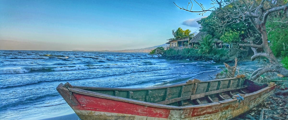 It looks and sounds just like the ocean, but Playa Santo Domingo is on Central America's largest lake. Ometepe Island is made up of two massive volcanoes, and Santo Domingo is its biggest beach. Here you'll see monkeys in the trees and horses bathing in the water. #BeachTips