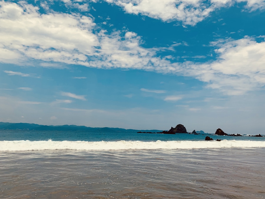 Here’s a beach that still manages to keep out big hotel chains and makes the trip one to fully enjoy the sea. #waves #pacific #sea #blue #beach #clearsky #mexico #mexicanbeach