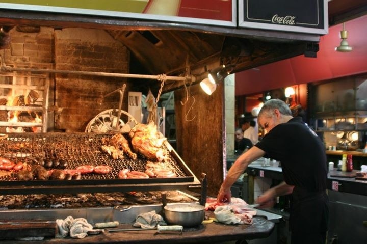 Meat, meat, meat!

Preparing the parilla for lunch at Mercado del Puerto in Montevideo.

#market