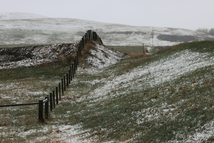 The last gasp of winter dusts the hills and fields near Black Diamond in Alberta.