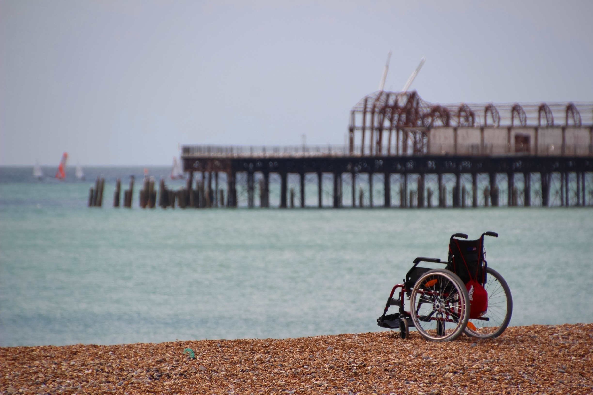 April 2014

A seemingly abandoned wheelchair sitting on Hastings beach in front of the burnt out remains of the town's pier.

#BeachBound