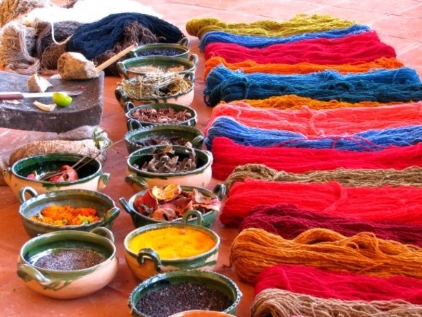 Demonstration on how to obtain natural dyes to give color to wool thread (which is used later to create rugs and other textiles).