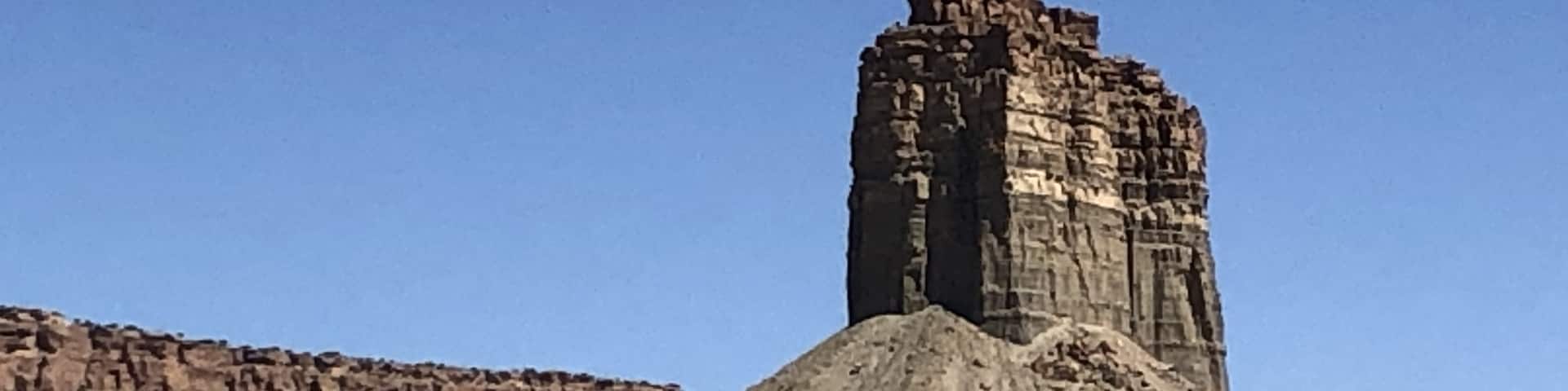 On our way to the Four Corners(CO, NM, AZ, UT) 
we stopped to take a photo of this butte that was about 250 feet tall. I could see it driving at least 25 miles ahead.